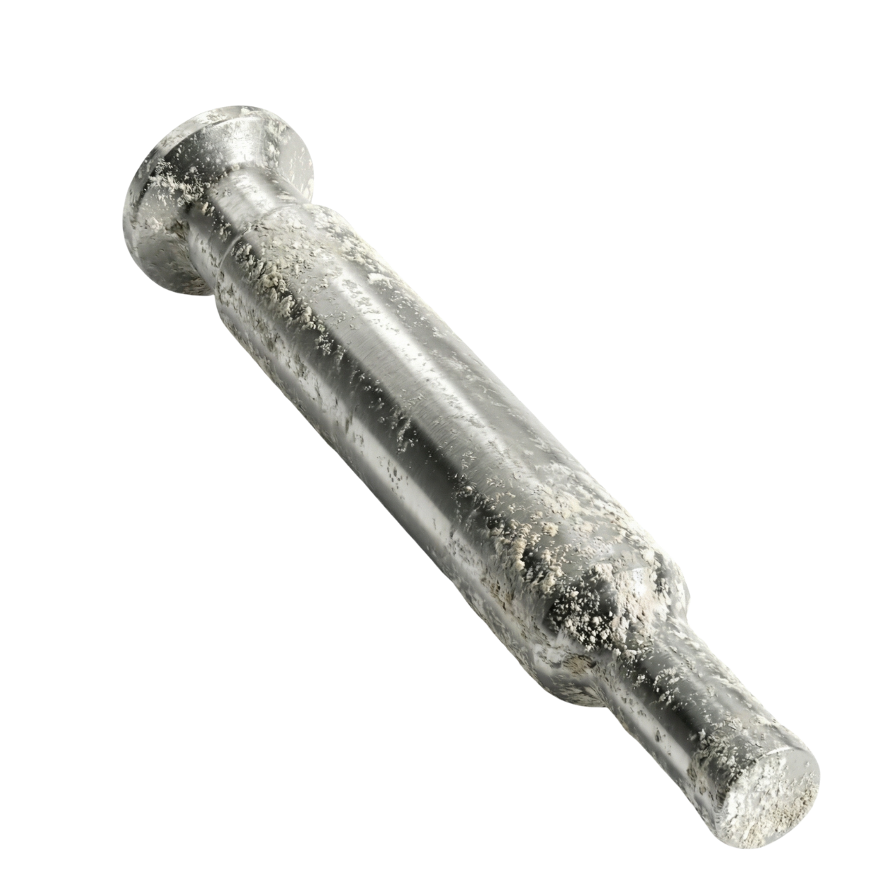 Punzón sin recubrimiento sufriendo adherencia (sticking) de polvo del granulado durante la compresión.